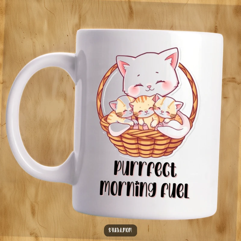 Funny mug showcasing a gentle mama cat cuddling her playful kittens nestled cozily in a basket, radiating maternal love.