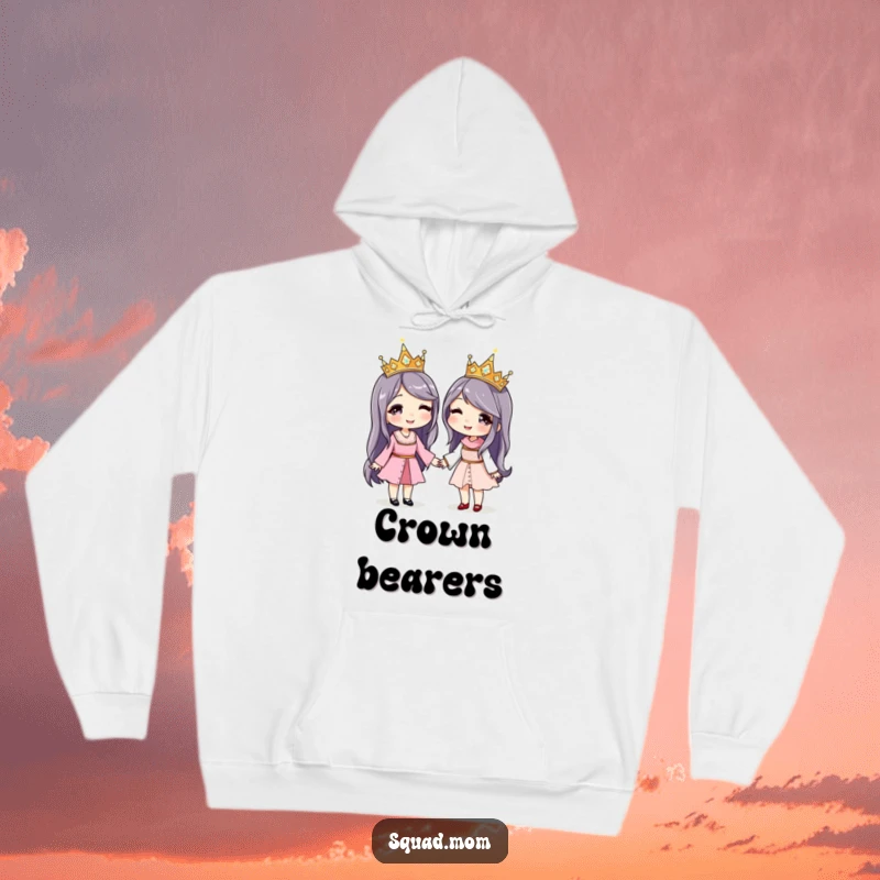Funny hoodie featuring two women holding hands, each wearing a matching sparkly crown, exuding joy and sisterhood.