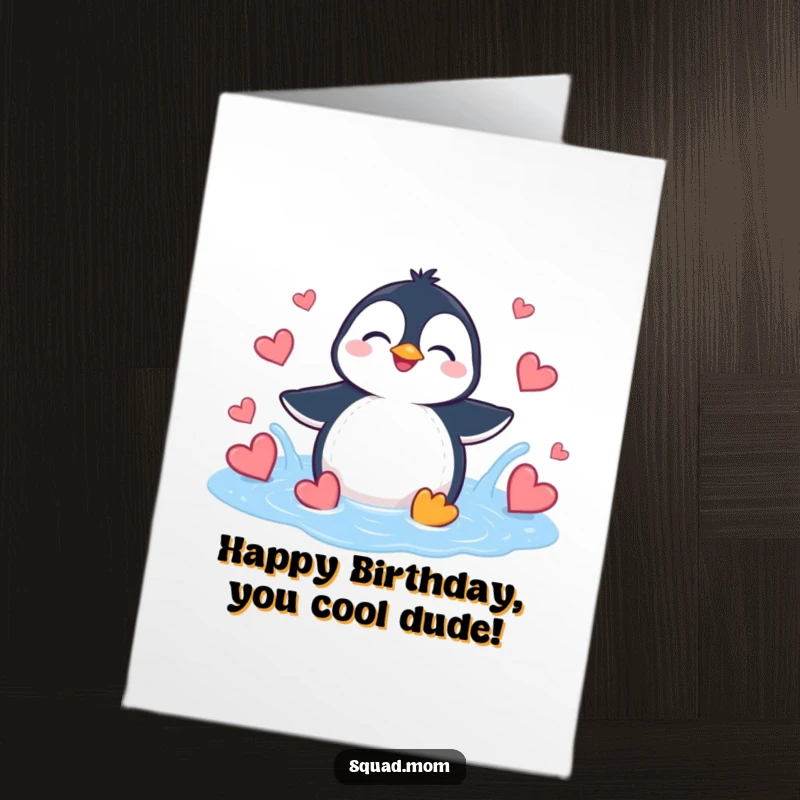 Funny Free Printable Birthday Card featuring a giggling penguin joyfully splashing in a puddle filled with red hearts.
