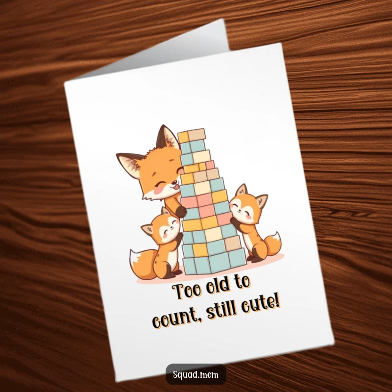Funny Free Printable Birthday Card: Fox mom and kits gleefully stacking colorful toy blocks, a chaotic celebration.