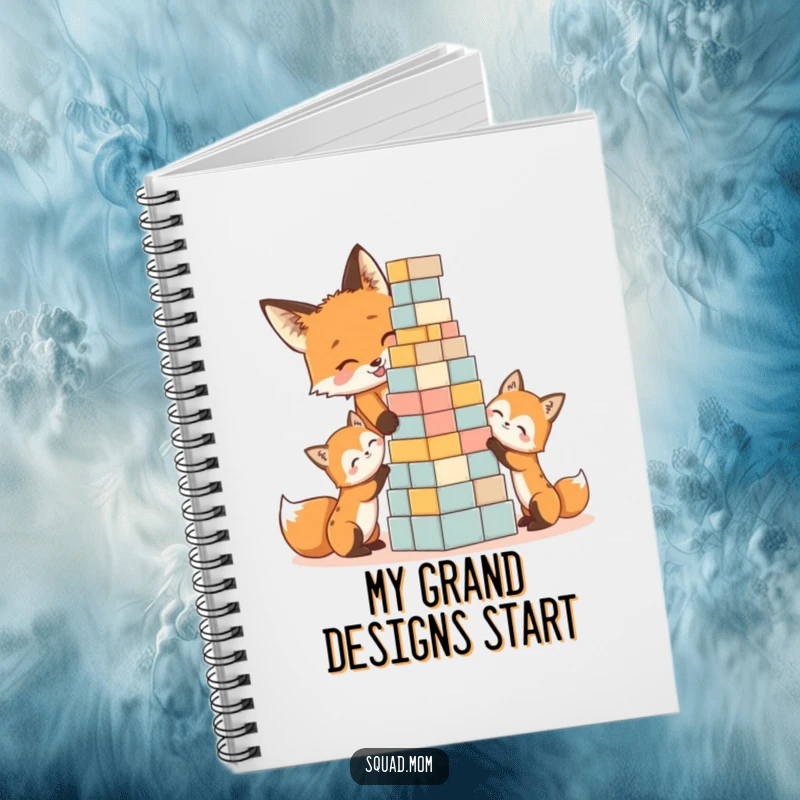 Funny notebook cover with a fox mom and kits focused on building a block tower, great for humorous journaling.