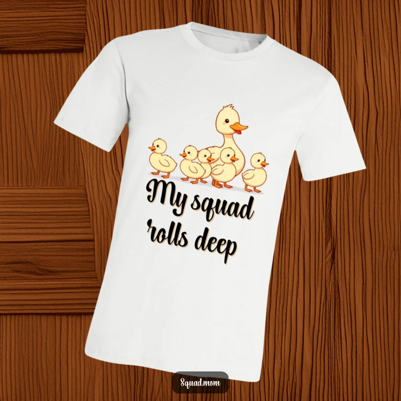 Funny t-shirt with a mom duck marching proudly with her ducklings in a neat single file line, conveying maternal guidance and humor.